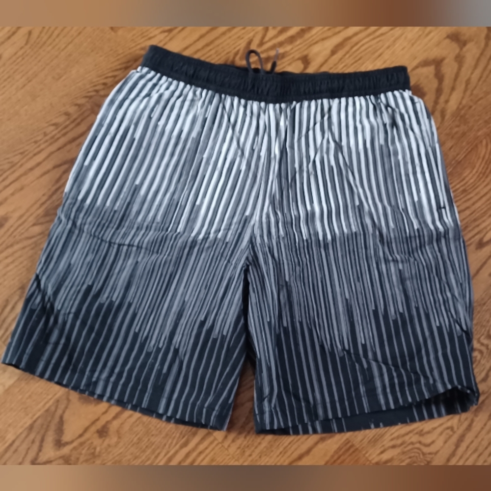 NWOT Men's swimming trunks size Small